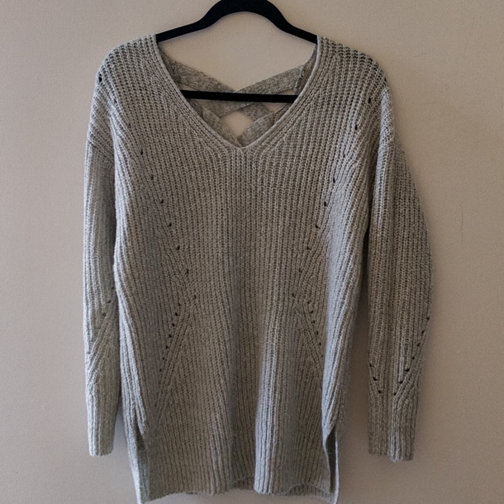 Light green tunic sweater with criss-cross back